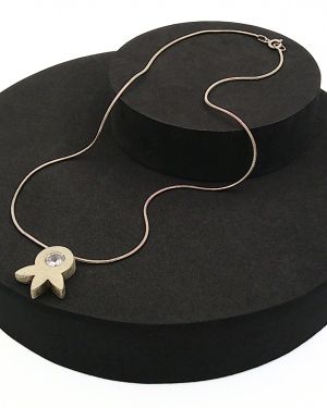 Brushed silver and cubic zirconia “leaf” pendant