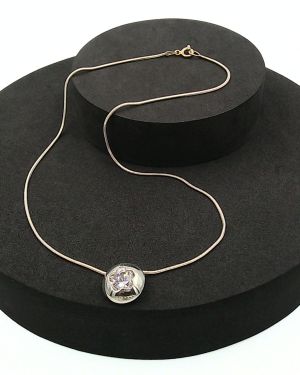 Cubic zirconia flower-shaped donut pendant